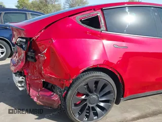 2022 Tesla Model Y Performance z VIN 7SAYGDEF0NF518740, wystawiony jako IAAI lot #41785358 z przebiegiem 50 692 mil mil oraz . Historia ofert i sprzedaży dostępna na DreamBid. Obrazek 20.