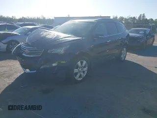 2016 Chevrolet Traverse LT with VIN 1GNKRGKD4GJ307061, listed as a IAAI auction lot 40880472 with 200,802 mi miles. Bid and sale history available at carsss.com. Image 2.