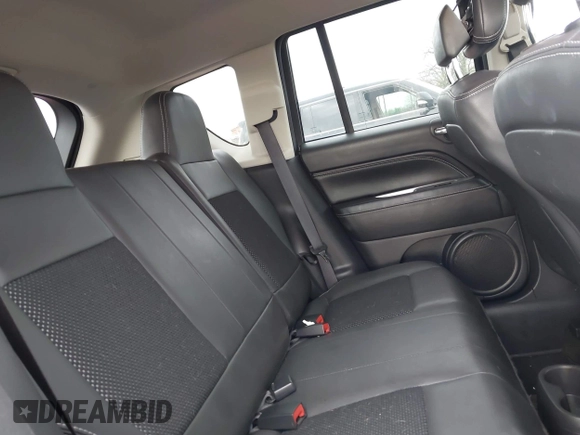 2014 Jeep Compass High Altitude with VIN 1C4NJCEA9ED647552, listed as a IAAI auction lot 41954070 with 110,474 mi miles. Bid and sale history available at carsss.com. Image 8.