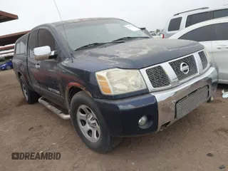 2007 Nissan Titan SE z VIN 1N6BA06A37N201620, wystawiony jako IAAI lot #41592224 z przebiegiem 156 052 mil mil oraz . Historia ofert i sprzedaży dostępna na DreamBid. Obrazek 1.