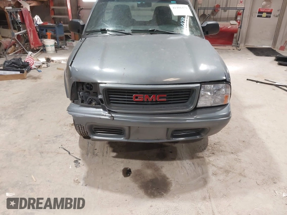 2002 GMC Sonoma SL z VIN 1GTCS145328187323, wystawiony jako IAAI lot #41486479 z przebiegiem 85 993 mil mil oraz . Historia ofert i sprzedaży dostępna na DreamBid. Obrazek 12.