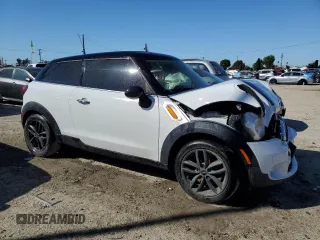 2013 MINI Paceman with VIN WMWSS1C51DWN94159, listed as a Copart auction lot 49740955 with 104,023 mi miles and Clean Title. Bid and sale history available at DreamBid. Image 4.