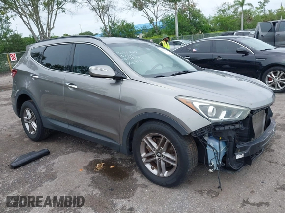 2017 Hyundai Santa Fe 2.4L with VIN 5NMZU3LB2HH014844, listed as a IAAI auction lot 42657624 with 93,533 mi miles and . Bid and sale history available at DreamBid. Image 1.