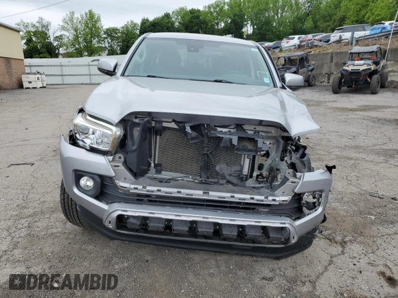 2021 Toyota Tacoma SR5 z VIN 3TYAZ5CN5MT004373, wystawiony jako Copart lot #58526145 z przebiegiem Nie podano mil oraz Szkoda całkowita • Salvage title. Historia ofert i sprzedaży dostępna na DreamBid. Obrazek 5.