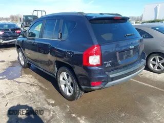 2011 Jeep Compass with VIN 1J4NF1FB6BD180447, listed as a IAAI auction lot 41575014 with 130,694 mi miles. Bid and sale history available at carsss.com. Image 3.