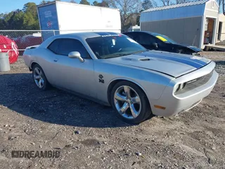 2012 Dodge Challenger R/T Classic z VIN 2C3CDYBT8CH233197, wystawiony jako IAAI lot #41486977 z przebiegiem 166 052 mil mil oraz . Historia ofert i sprzedaży dostępna na DreamBid. Obrazek 1.