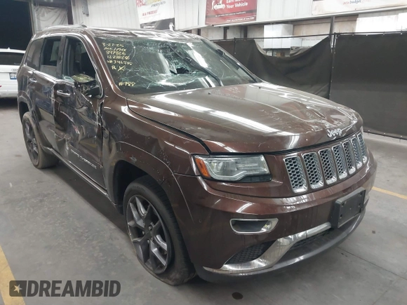 2014 Jeep Grand Cherokee Summit with VIN 1C4RJFJT6EC346575, listed as a IAAI auction lot 41881795 with 148,941 mi miles and . Bid and sale history available at DreamBid. Image 1.