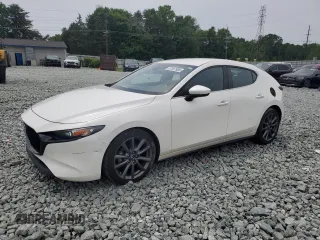 2020 Mazda 3 Preferred with VIN JM1BPAMM9L1169259, listed as a Copart auction lot 57057985 with 67,021 mi miles and Salvage title. Bid and sale history available at DreamBid. Image 1.