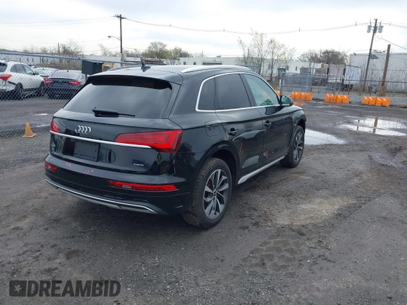 2021 Audi Q5 Premium Plus with VIN WA1BAAFYXM2117064, listed as a IAAI auction lot 42025878 with 75,766 mi miles and . Bid and sale history available at DreamBid. Image 4.