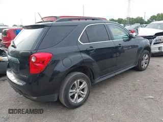 2015 Chevrolet Equinox LT z VIN 2GNALBEK6F6323834, wystawiony jako IAAI lot #42346040 z przebiegiem 132 065 mil mil oraz . Historia ofert i sprzedaży dostępna na DreamBid. Obrazek 4.