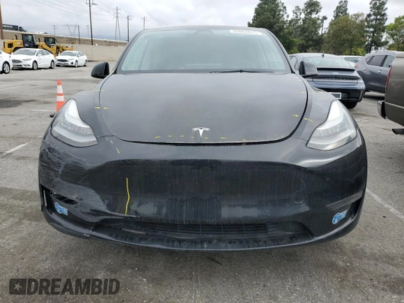 2021 Tesla Model Y Long Range z VIN 5YJYGAEE5MF143672, wystawiony jako Copart lot #55962875 z przebiegiem 74 644 mil mil oraz Szkoda całkowita • Salvage title. Historia ofert i sprzedaży dostępna na DreamBid. Obrazek 5.