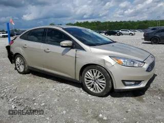 2017 Ford Focus Titanium с VIN 1FADP3J28HL256188, выставлен на аукционе Copart как лот 56500435 с пробегом 88 239 миль миль и Списание • Salvage title. История ставок и продаж доступна на DreamBid. Изображение 4.
