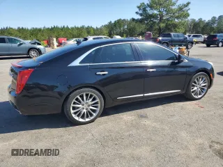 2014 Cadillac XTS Premium z VIN 2G61P5S3XE9238362, wystawiony jako Copart lot #52135695 z przebiegiem 122 428 mil mil oraz Szkoda całkowita • Salvage title. Historia ofert i sprzedaży dostępna na DreamBid. Obrazek 3.