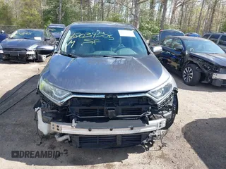 2017 Honda CR-V EX with VIN 2HKRW2H5XHH678674, listed as a IAAI auction lot 42039505 with 124,891 mi miles. Bid and sale history available at carsss.com. Image 13.