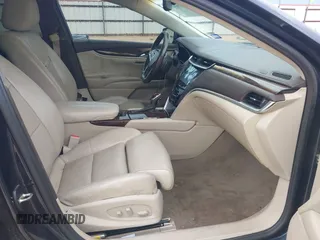 2013 Cadillac XTS Luxury with VIN 2G61P5S39D9182526, listed as a IAAI auction lot 42183995 with 132,778 mi miles. Bid and sale history available at carsss.com. Image 5.