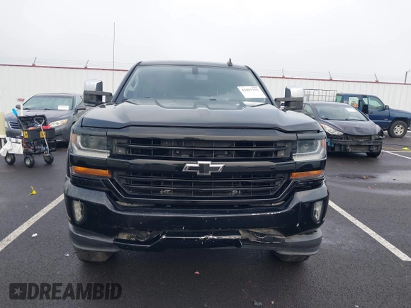 2017 Chevrolet Silverado 1500 LT with VIN 1GCUKREC1HF117744, listed as a IAAI auction lot 41091255 with 61,984 mi miles and . Bid and sale history available at DreamBid. Image 12.