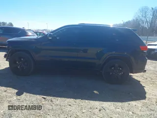 2014 Jeep Grand Cherokee Overland with VIN 1C4RJFCT5EC105880, listed as a IAAI auction lot 41701105 with 169,930 mi miles. Bid and sale history available at carsss.com. Image 15.