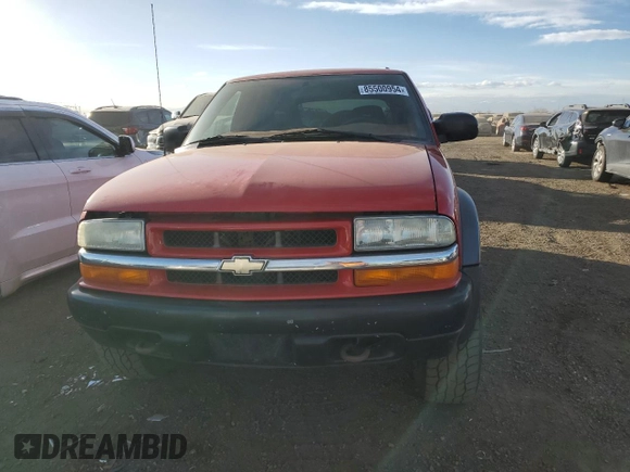 2004 Chevrolet Blazer LS z VIN 1GNCT18X34K141674, wystawiony jako Copart lot #85500954 z przebiegiem Nie podano mil oraz Czysty tytuł • Clean title. Historia ofert i sprzedaży dostępna na DreamBid. Obrazek 5.