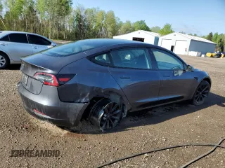 2023 Tesla Model 3 z VIN 5YJ3E1EAXPF404814, wystawiony jako Copart lot #56857105 z przebiegiem 59 360 mil mil oraz Czysty tytuł • Clean title. Historia ofert i sprzedaży dostępna na DreamBid. Obrazek 3.