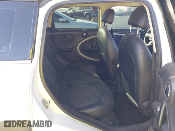 2014 MINI Countryman with VIN WMWZB3C59EWR40065, listed as a IAAI auction lot 40838816 with 80,000 mi miles and . Bid and sale history available at DreamBid. Image 8.