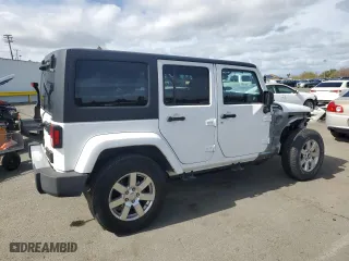 2015 Jeep Wrangler Unlimited Sahara with VIN 1C4BJWEG2FL577845, listed as a Copart auction lot 51267315 with 125,830 mi miles and Salvage Title. Bid and sale history available at carsss.com. Image 3.