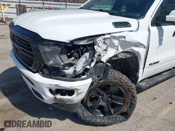 2020 Ram 1500 Big Horn with VIN 1C6SRFFT1LN103090, listed as a IAAI auction lot 41919577 with 70,429 mi miles and . Bid and sale history available at DreamBid. Image 6.