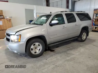2013 Chevrolet Suburban LT with VIN 1GNSKJE79DR211494, listed as a Copart auction lot 62461755 with 206,882 mi miles and Salvage title. Bid and sale history available at DreamBid. Image 1.