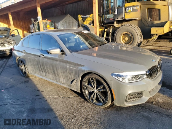 2019 BMW 5 Series M550i xDrive with VIN WBAJB9C55KB288709, listed as a Copart auction lot 46590735 with 58,256 mi miles and Salvage title. Bid and sale history available at DreamBid. Image 4.