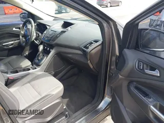 2015 Ford Escape SE with VIN 1FMCU0G75FUC20011, listed as a IAAI auction lot 42113751 with 182,516 mi miles. Bid and sale history available at carsss.com. Image 5.