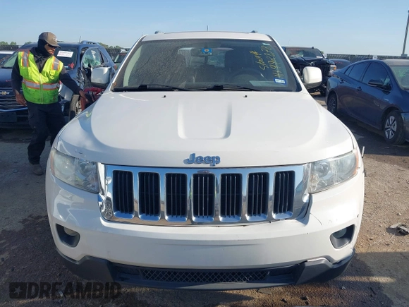 2011 Jeep Grand Cherokee Laredo with VIN 1J4RR4GG4BC703071, listed as a IAAI auction lot 41992878 with 126,199 mi miles and . Bid and sale history available at DreamBid. Image 12.