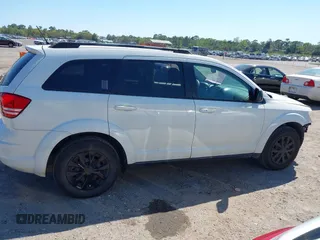 2017 Dodge Journey SE with VIN 3C4PDCAB5HT569154, listed as a IAAI auction lot 41891552 with 126,861 mi miles and . Bid and sale history available at DreamBid. Image 13.