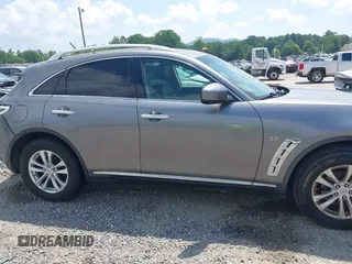 2014 Infiniti QX70 with VIN JN8CS1MW5EM411653, listed as a IAAI auction lot 42690935 with 110,806 mi miles and . Bid and sale history available at DreamBid. Image 13.