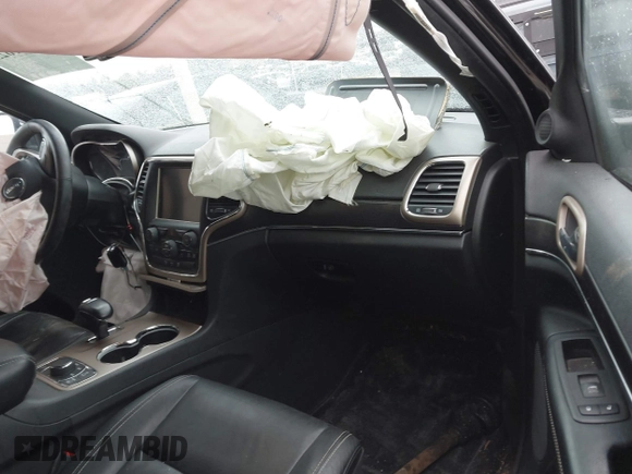 2014 Jeep Grand Cherokee Limited with VIN 1C4RJFBG2EC279944, listed as a IAAI auction lot 41591623 with 150,588 mi miles and . Bid and sale history available at DreamBid. Image 5.