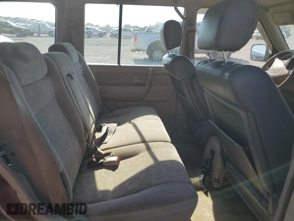 2000 Isuzu Trooper S with VIN JACDJ58X2Y7J11793, listed as a Copart auction lot 77431754 with 214,854 mi miles and Clean title. Bid and sale history available at DreamBid. Image 11.