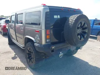 2004 Hummer H2 z VIN 5GRGN23U34H105809, wystawiony jako IAAI lot #42456055 z przebiegiem Nie podano mil oraz . Historia ofert i sprzedaży dostępna na DreamBid. Obrazek 3.