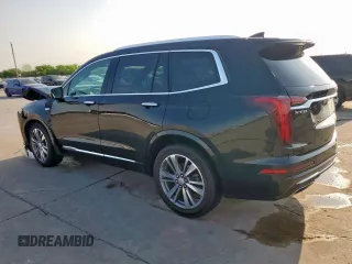 2021 Cadillac XT6 Premium Luxury z VIN 1GYKPCRS3MZ195999, wystawiony jako Copart lot #53261595 z przebiegiem 81 843 mil mil oraz Szkoda całkowita • Salvage title. Historia ofert i sprzedaży dostępna na DreamBid. Obrazek 2.