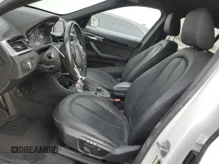2018 BMW X1 sDrive28i with VIN WBXHU7C37J5H44386, listed as a Copart auction lot 42167135 with 96,668 mi miles and Salvage Title. Bid and sale history available at DreamBid. Image 7.