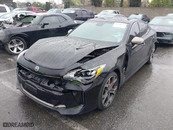 2018 Kia Stinger GT1 with VIN KNAE45LC4J6035780, listed as a IAAI auction lot 41560394 with 86,312 mi miles. Bid and sale history available at carsss.com. Image 2.