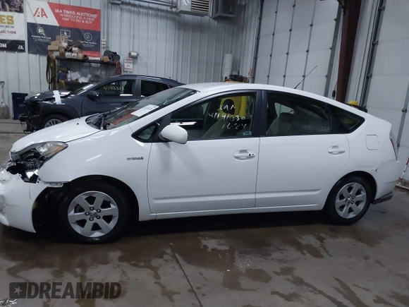 2008 Toyota Prius z VIN JTDKB20UX83407612, wystawiony jako IAAI lot #41141030 z przebiegiem 240 479 mil mil oraz . Historia ofert i sprzedaży dostępna na DreamBid. Obrazek 14.