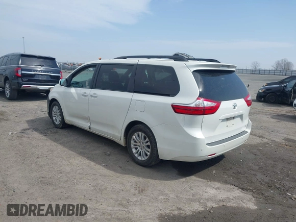 2017 Toyota Sienna XLE Auto Access Seat with VIN 5TDYZ3DC2HS793132, listed as a IAAI auction lot 41769803 with 145,112 mi miles and . Bid and sale history available at DreamBid. Image 3.