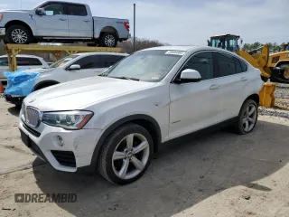 2015 BMW X4 xDrive28i with VIN 5UXXW3C59F0F89517, listed as a Copart auction lot 49989304 with 65,554 mi miles. Bid and sale history available at carsss.com. Image 1.