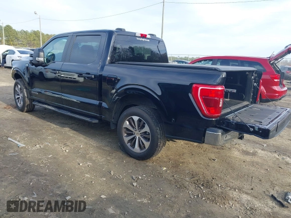 2021 Ford F-150 XL with VIN 1FTFW1CD4MFC76410, listed as a IAAI auction lot 41405983 with 79,768 mi miles and . Bid and sale history available at DreamBid. Image 3.