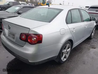 2009 Volkswagen Jetta Sedan S with VIN 3VWJZ71K29M148712, listed as a IAAI auction lot 41724523 with 112,043 mi miles. Bid and sale history available at carsss.com. Image 4.