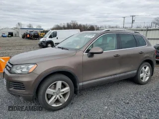 2014 Volkswagen Touareg Sport with VIN WVGEF9BP2ED014075, listed as a Copart auction lot 48207125 with 224,882 mi miles and Clean Title. Bid and sale history available at DreamBid. Image 1.