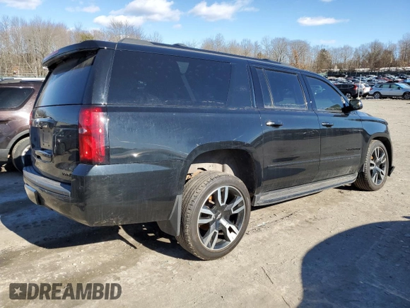 2019 Chevrolet Suburban Premier with VIN 1GNSKJKC7KR146871, listed as a Copart auction lot 43017234 with 96,965 mi miles and Salvage Title. Bid and sale history available at DreamBid. Image 3.
