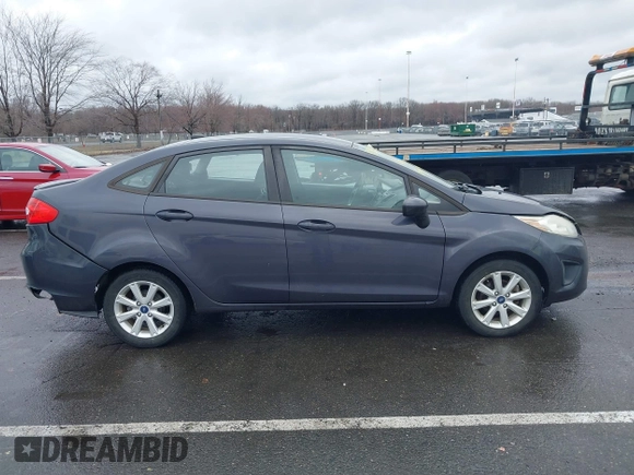 2012 Ford Fiesta SE with VIN 3FADP4BJ0CM155729, listed as a IAAI auction lot 41800447 with 90,091 mi miles. Bid and sale history available at carsss.com. Image 13.