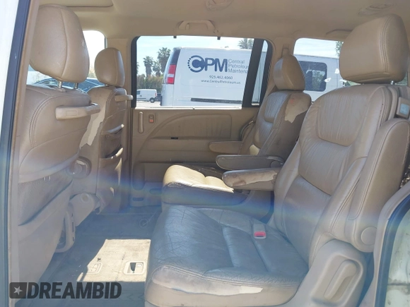 2005 Honda Odyssey EX-L with VIN 5FNRL38605B045246, listed as a IAAI auction lot 42183883 with 164,072 mi miles and . Bid and sale history available at carsss.com. Image 8.