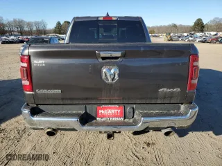 2021 Ram 1500 Laramie with VIN 1C6SRFJTXMN665384, listed as a Copart auction lot 42037685 with 76,836 mi miles and Salvage Title. Bid and sale history available at carsss.com. Image 6.