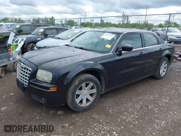 2005 Chrysler 300 Touring with VIN 2C3AA53G85H155393, listed as a IAAI auction lot 42171752 with 225,385 mi miles and . Bid and sale history available at DreamBid. Image 18.
