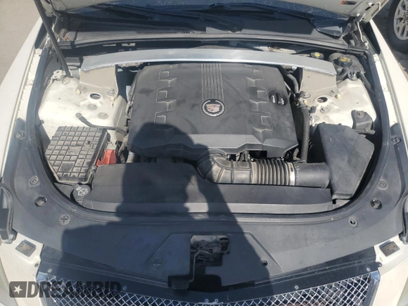 2013 Cadillac CTS z VIN 1G6DA1E3XD0104706, wystawiony jako Copart lot #78226674 z przebiegiem 96 022 mil mil oraz Szkoda całkowita • Salvage title. Historia ofert i sprzedaży dostępna na DreamBid. Obrazek 11.